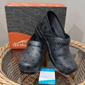 Dansko Women's Black Floral Clogs